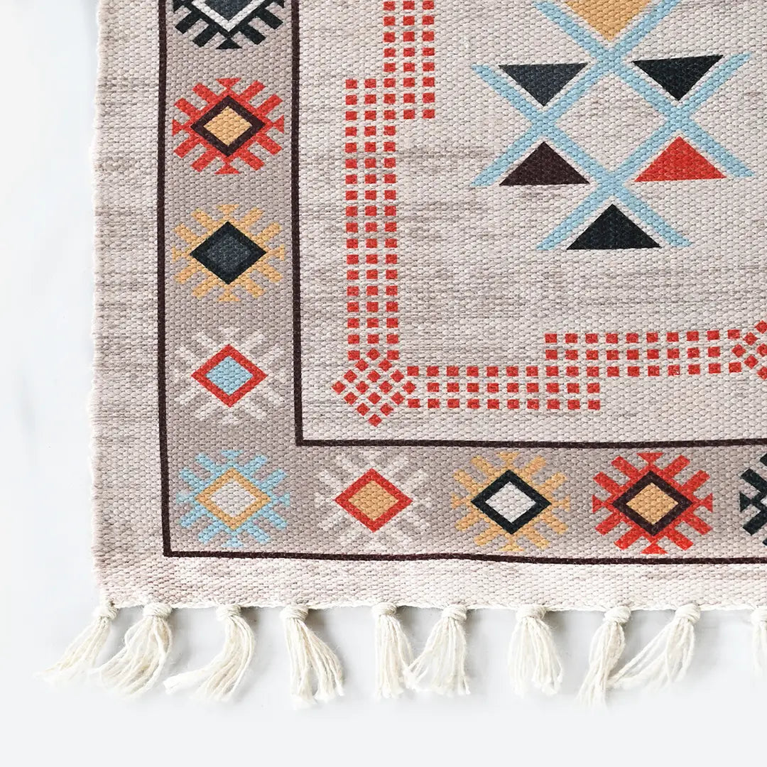 Earth-Tone Rug with Symmetrical Geometric and Stylized Floral Patterns