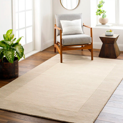 Hand Loomed Mystique Cream Wool Solid Rug